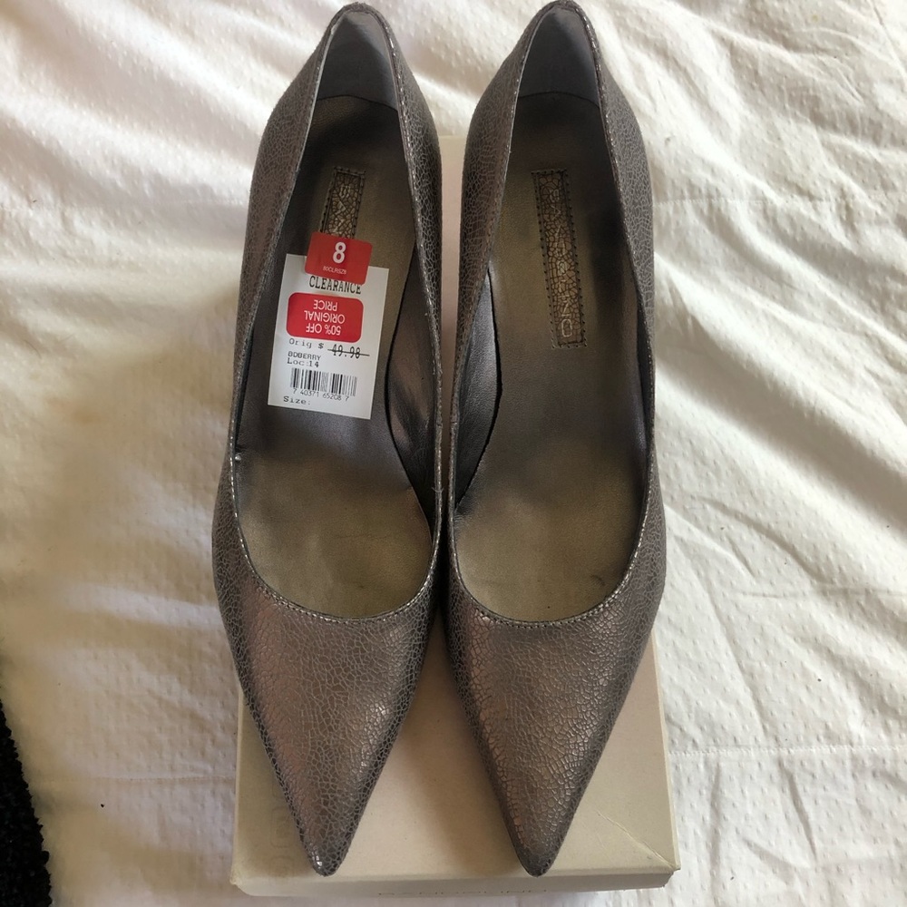 Never worn. Kitten heels. Bronze gold.